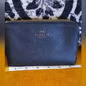 Black and white coach wristlet